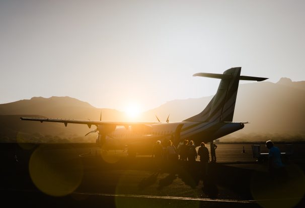 passengers boarding aircraft